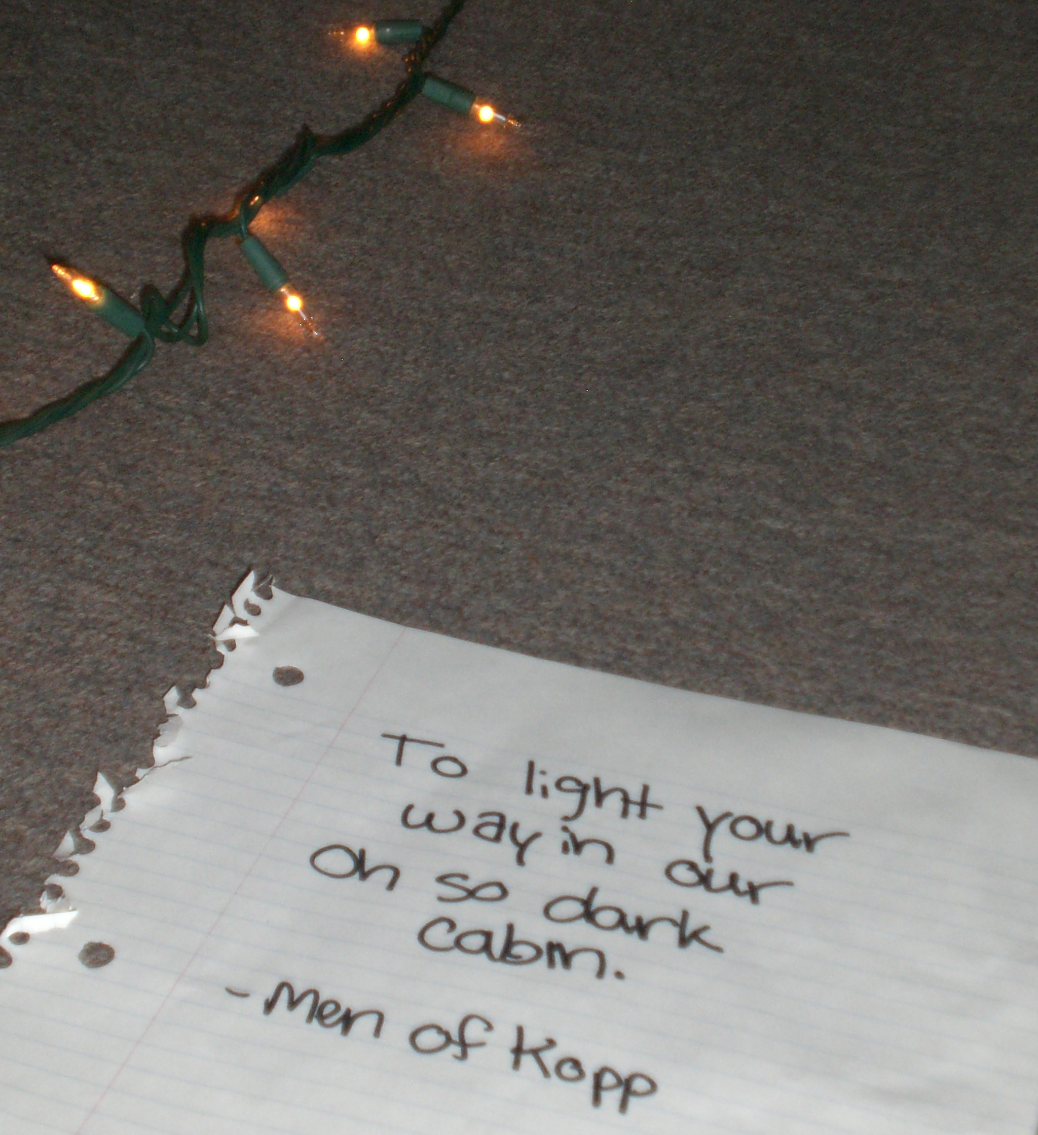 string of lights with note that reads: To light your way in our oh so dark cabin. - Men of Kopp