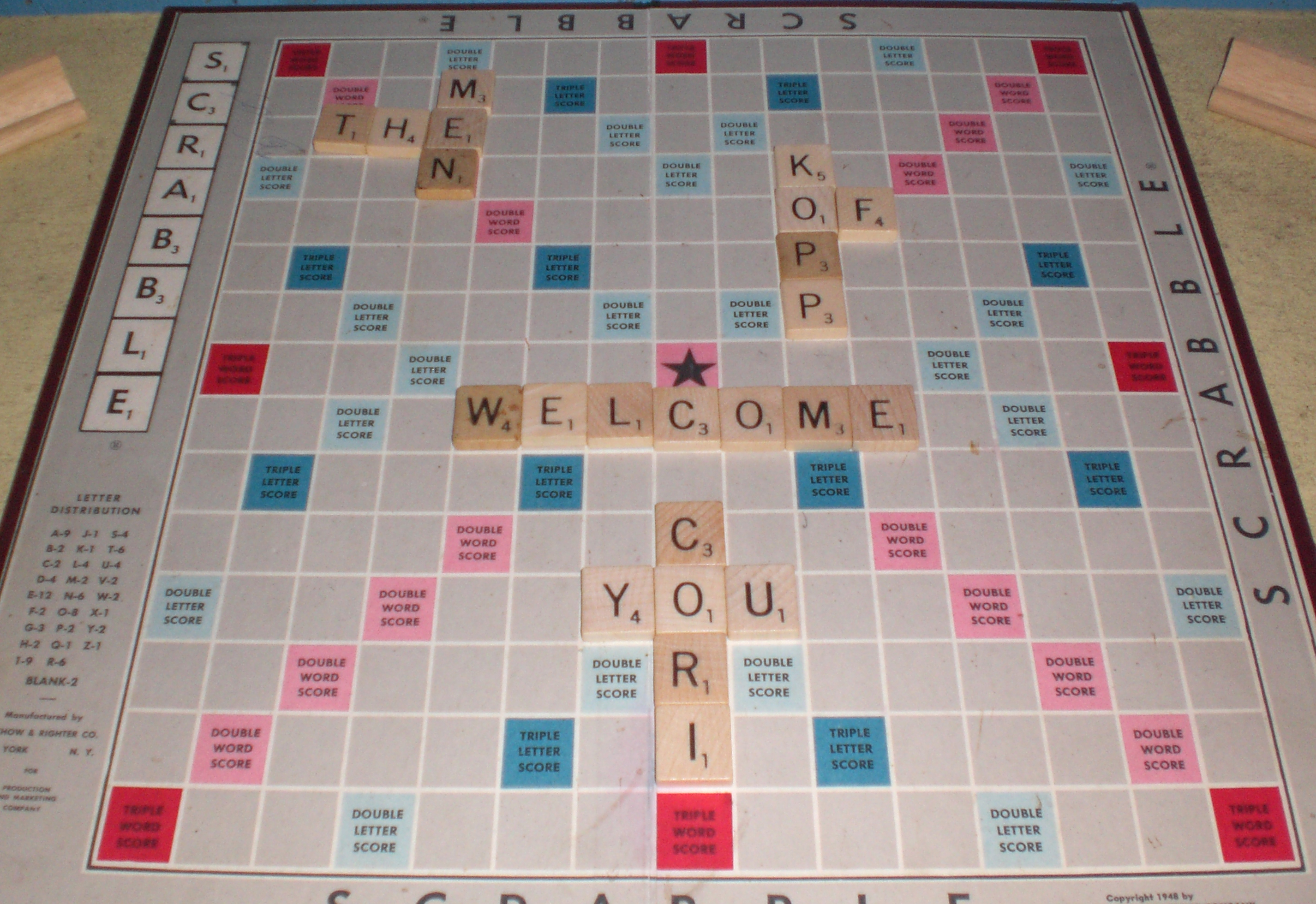 Scrabble board with welcome greeting