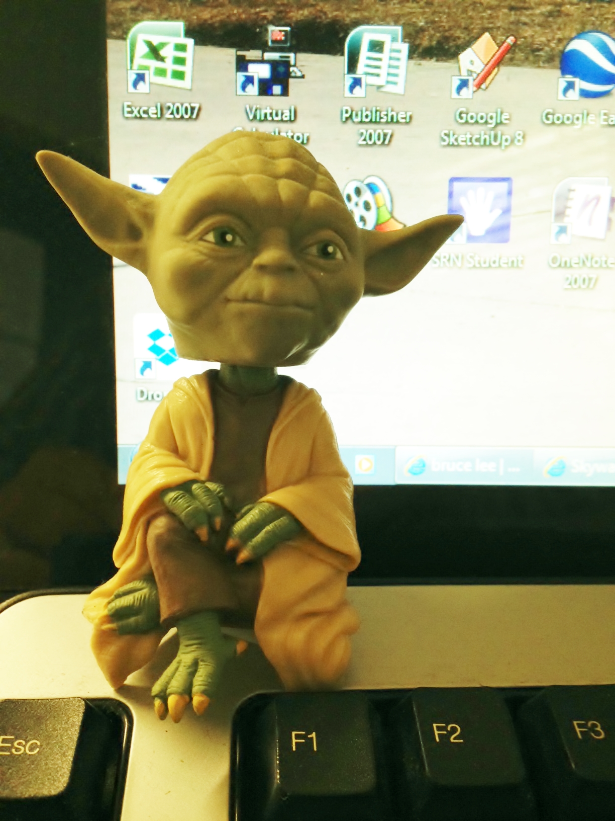 Yoda figurine on desktop