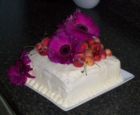fancy cake decorated with bright flowers