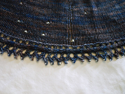 Intricate border of the Celesterium shawl with shiny beads