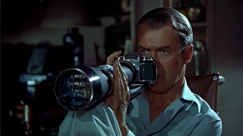 Scene from rear window: Cary Grant with camera