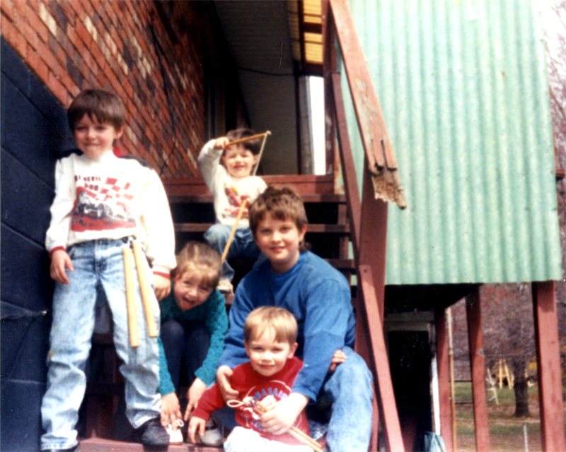 Kaitlin, her brothers, and cousins in 1991