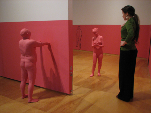 fig 7: gallery observer standing in-between rooms and in-between sculptures