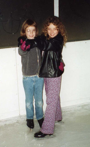 two girls ice skating