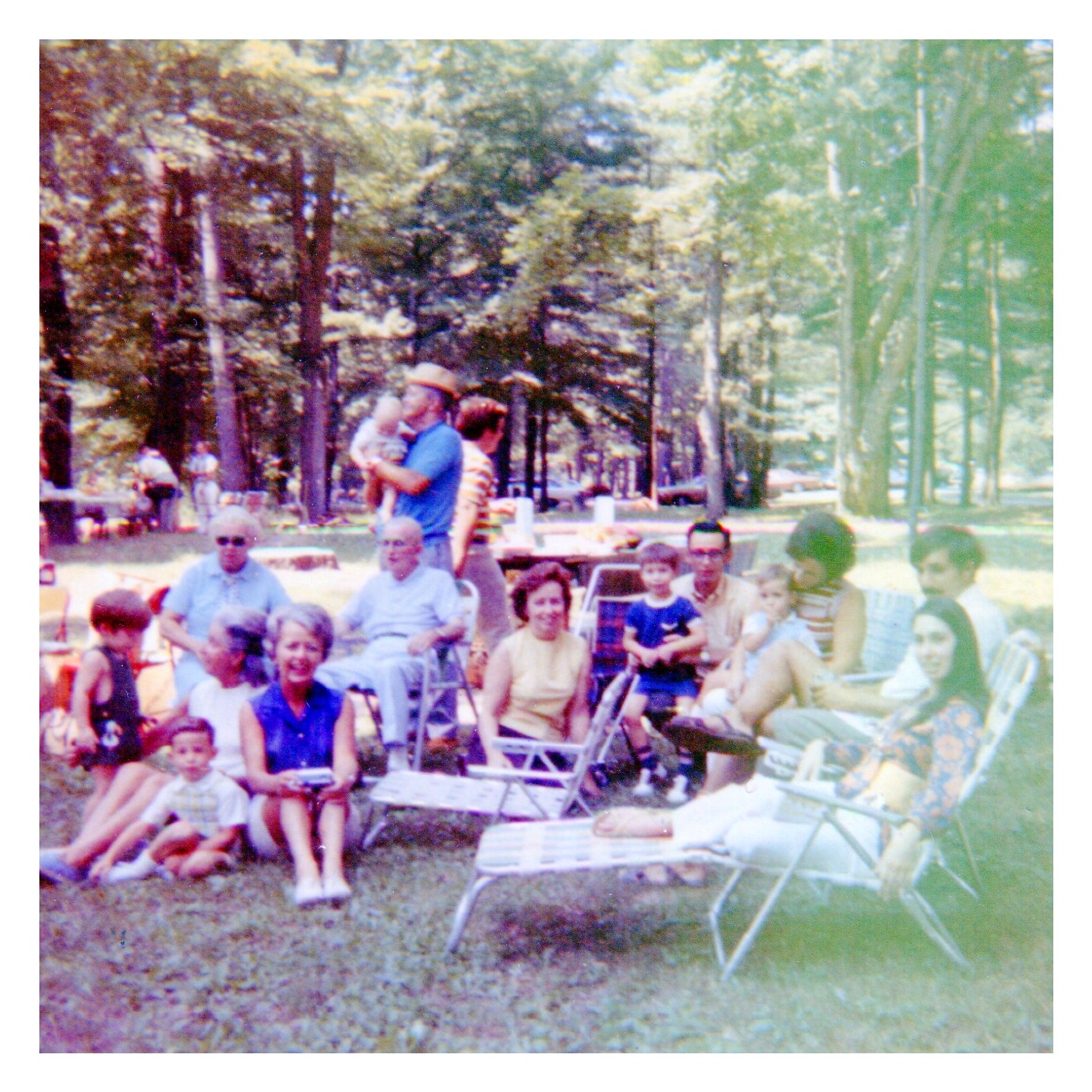 family gathered under tree